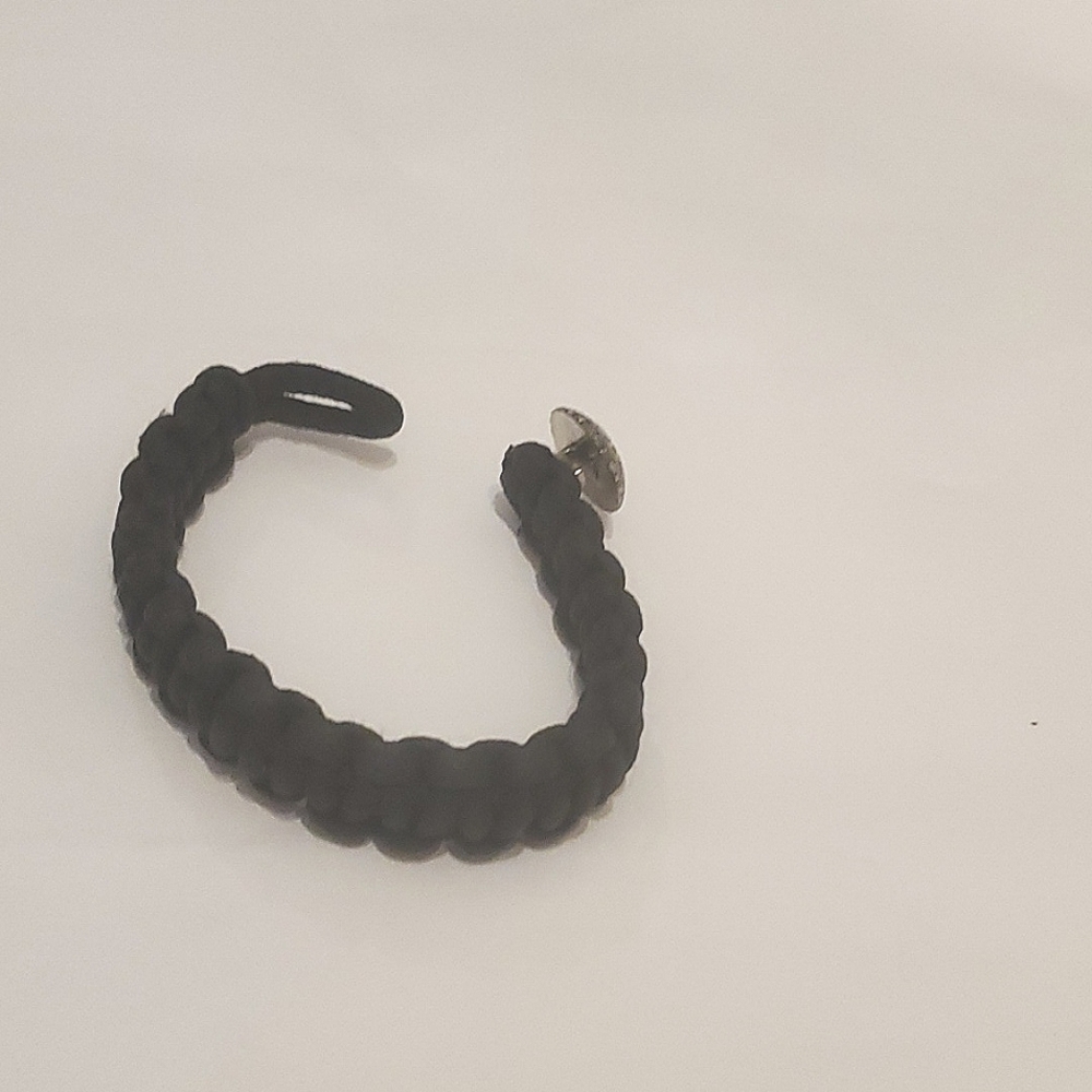 Black Paracord Bracelet with Silver Tone button clasp. AKA a Survival Bracelet.